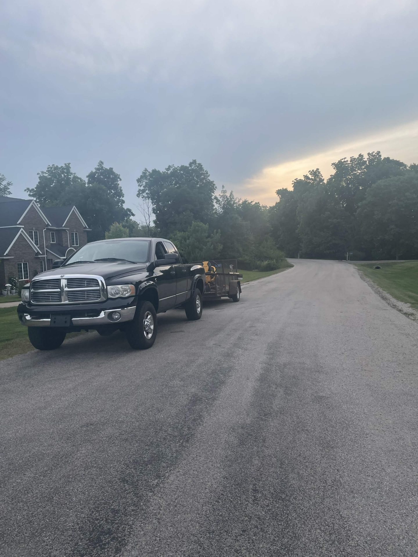 Hanzelka's truck and trailer on the way to a job